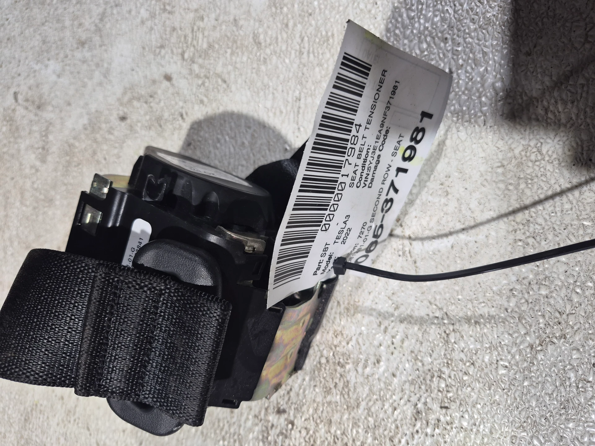 Second Row - Seat Belt Retractor Assembly - Black · 1
