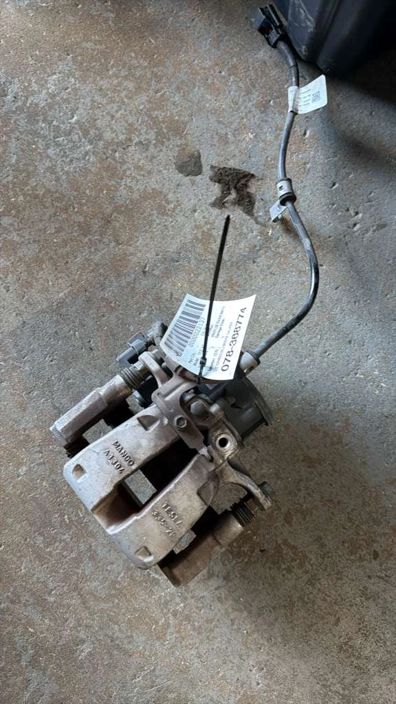 Lh Brake Caliper Rear · 1