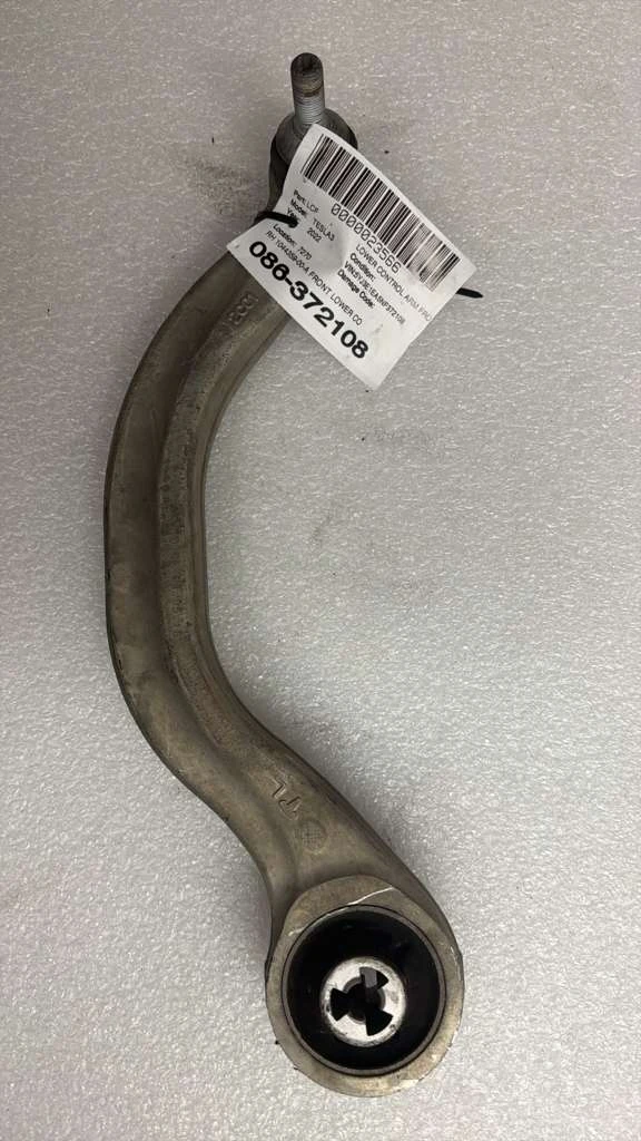 Rh Front Lower Compliance Link Assy · 2