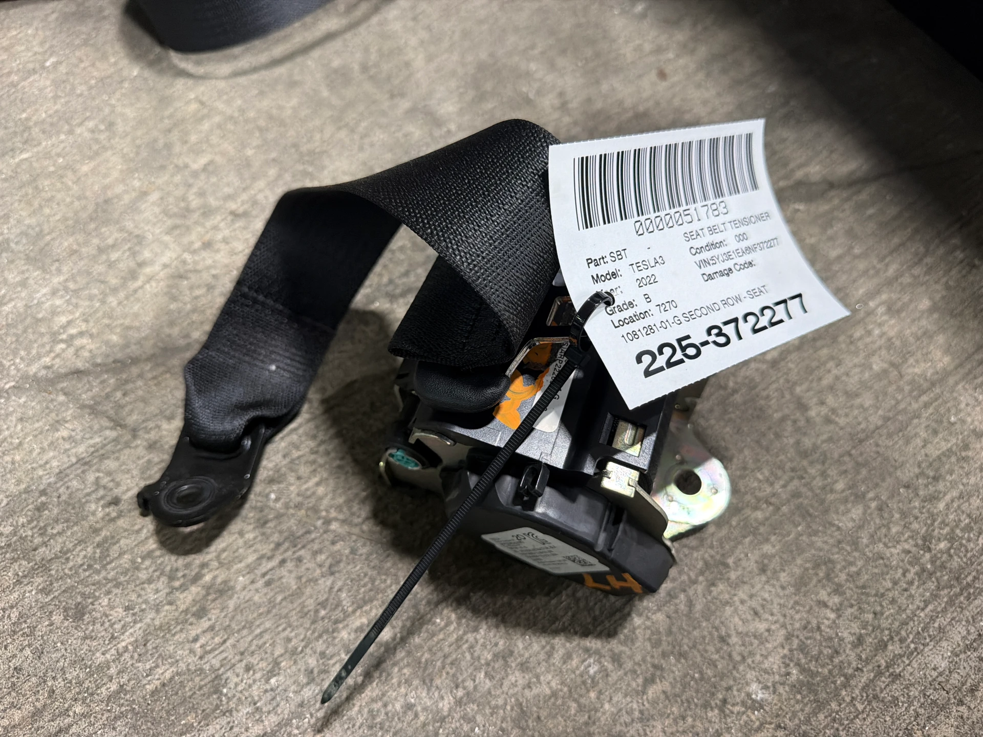 Second Row - Seat Belt Retractor Assembly - Black · 1
