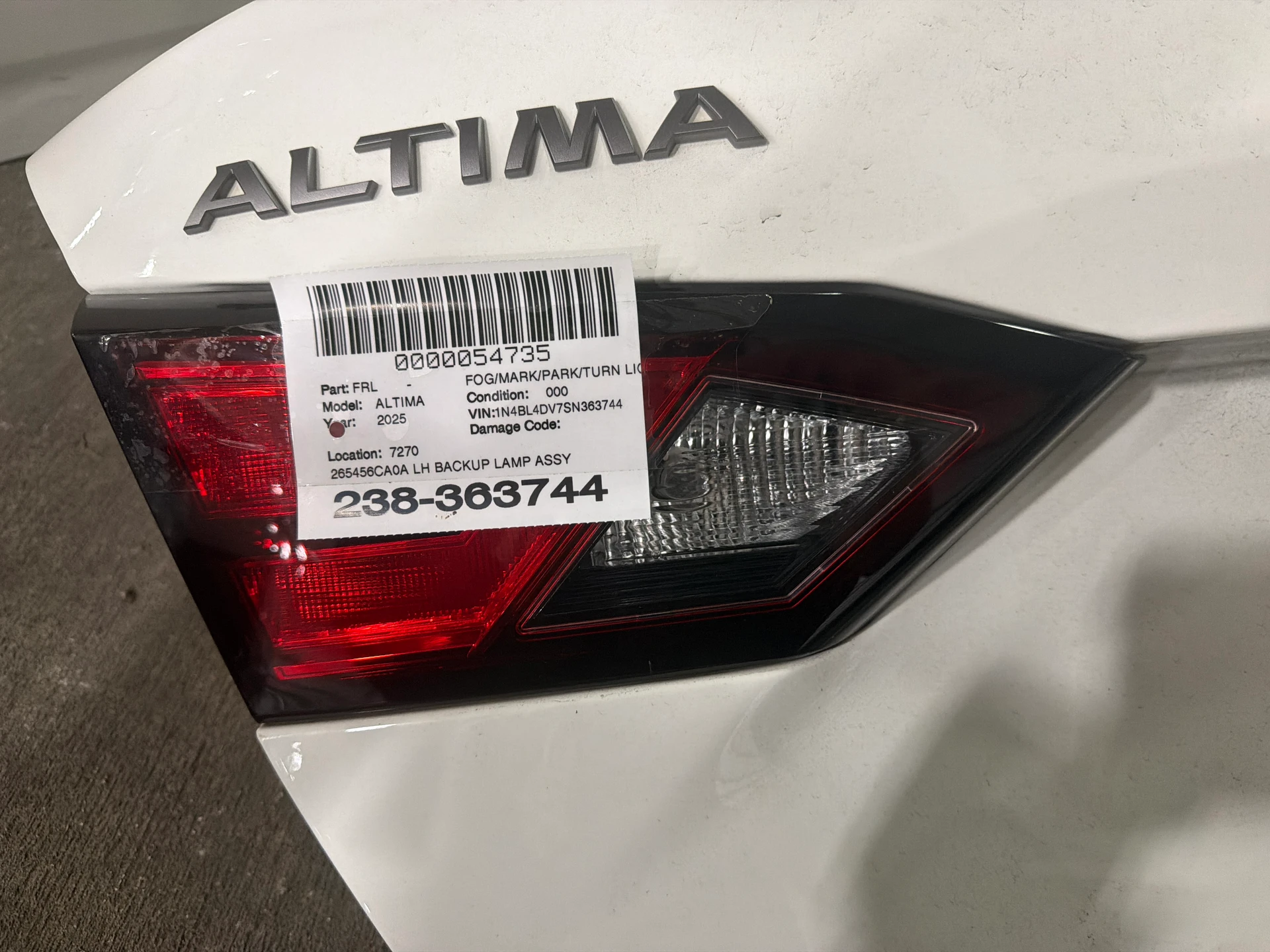 Lh Backup Lamp Assy · 1