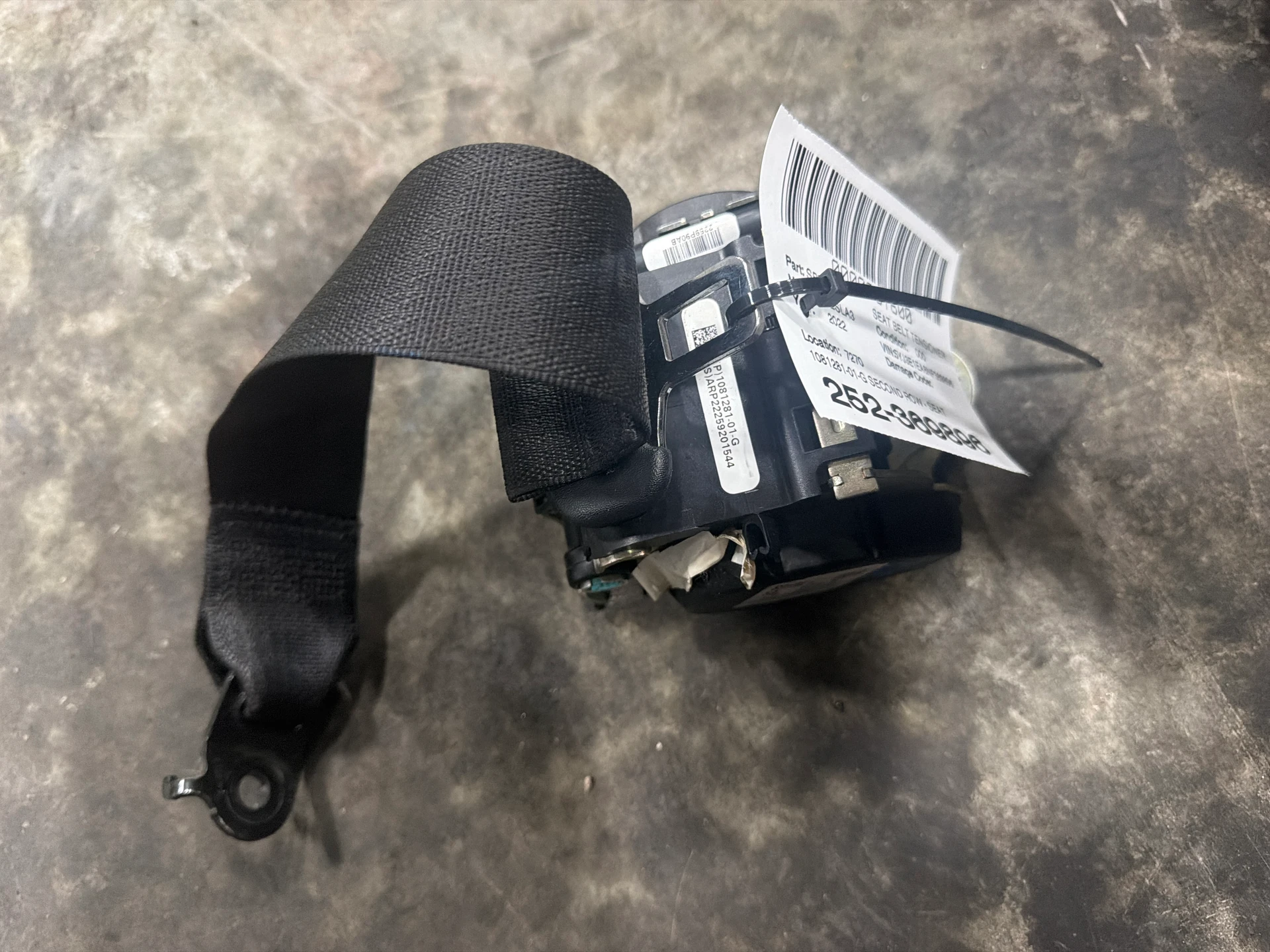 Second Row - Seat Belt Retractor Assembly - Black · 1