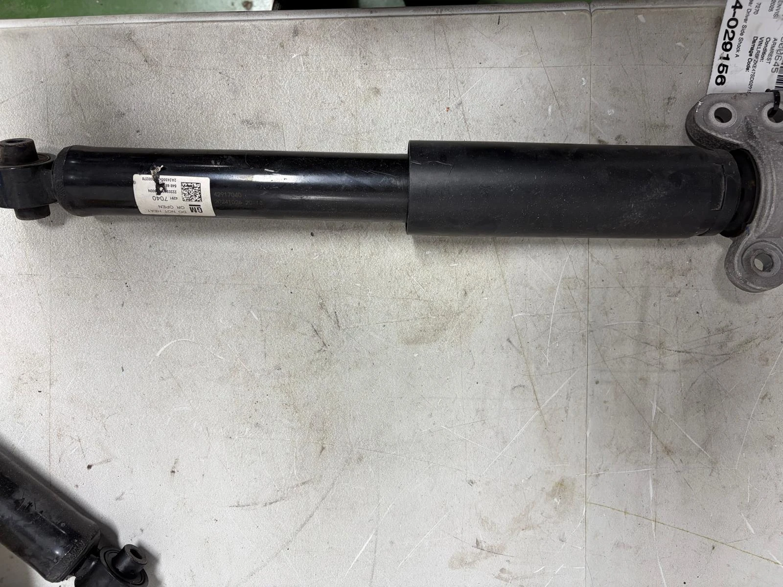 Rear Driver Side Shock Absorber With Upper Mount Rh · 1